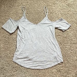 Gray tank top with shoulder cut outs